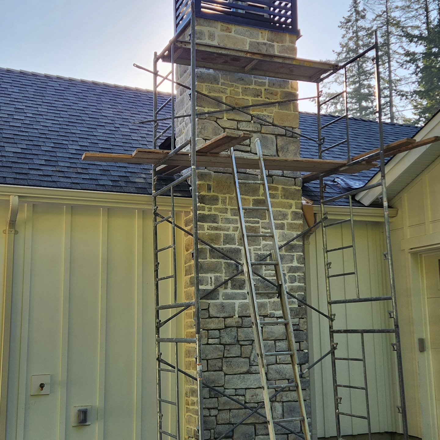 Custom metal work for roof penetration flashing in Chilliwack