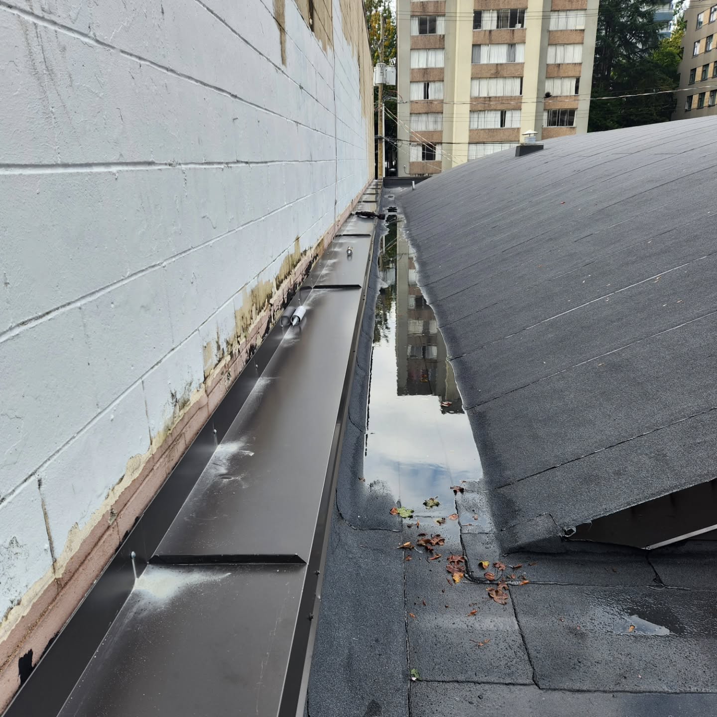 Precision metal work for skylight flashing in Mission BC